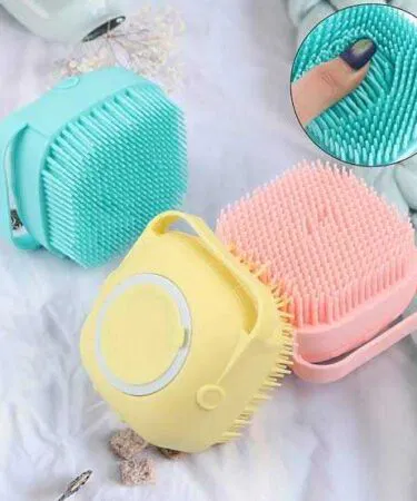 Silicone body bath brush with shower gel dispenser, soft bristles for all skin types, quick-drying, sold in Pakistan