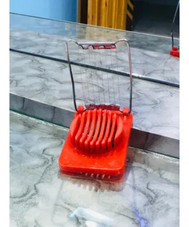 Boiled egg slicer and cutter for easy meal preparation, available in Pakistan