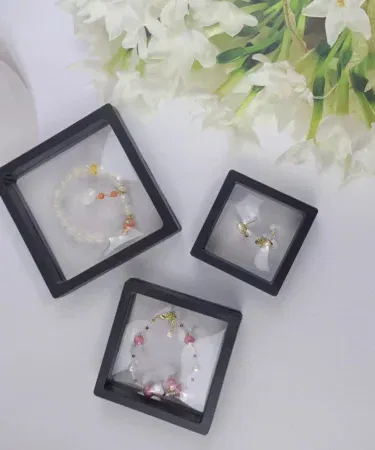 Transparent PE film jewelry and artificial nails packing box, 9cm x 9cm, modern design storage solution in Pakistan