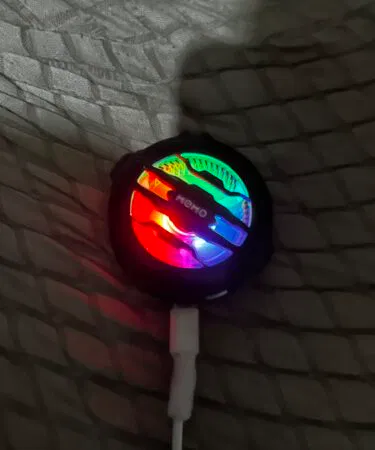 Mobile cooling fan CX07 memo with RGB lighting, magnetic sheet, and attachment strips for phones in Pakistan