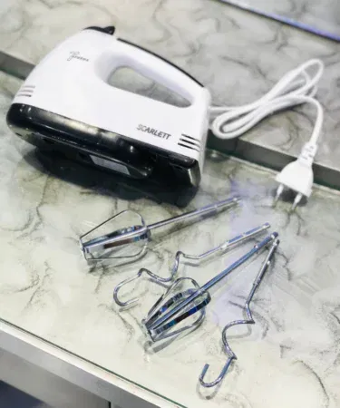 Electric hand beater machine with 7 speeds, ideal for baking in Pakistan.