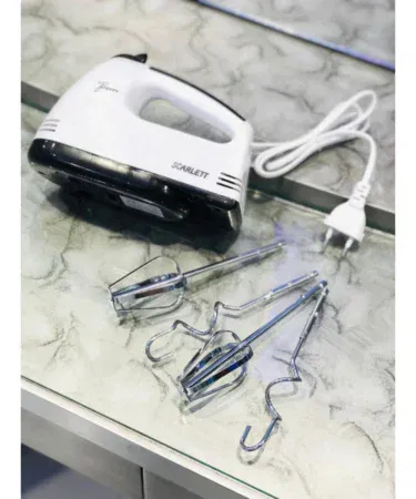 Electric hand beater machine with 7 speeds, ideal for baking in Pakistan.