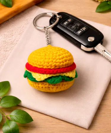 Handmade crochet burger keychain, cute amigurumi hamburger bag charm and key ring for sale in Pakistan.