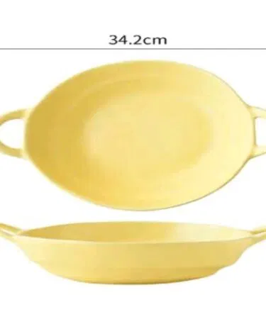 Irregular off-white and yellow ceramic serving bowl with handles for sale in Pakistan