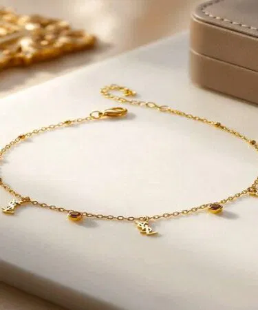 Chic golden monogram charm anklet with crystal accents, adjustable, stainless steel, imported, sold in Pakistan