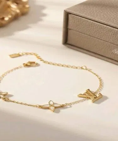 Elegant LV Monogram & White Clover Charm Bracelet | Khareedo