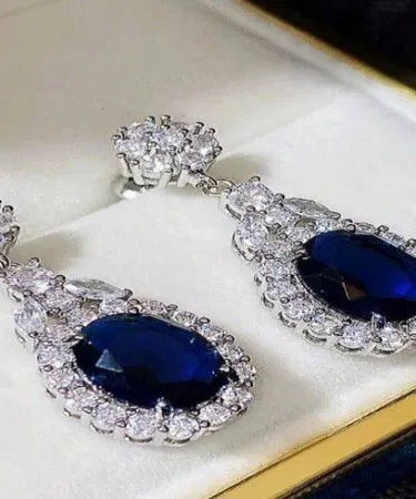 Royal Velvet Sapphire Blue Oval Teardrop Halo Earrings | Khareedo