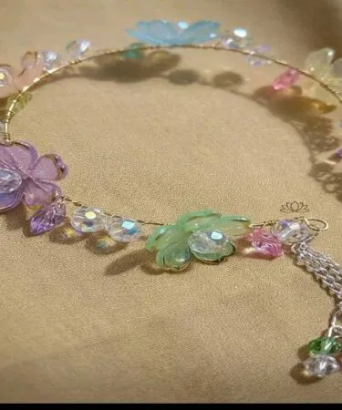 Elegant women's Qara hair accessories with flower and crystal embellishments, adjustable, easy to wear