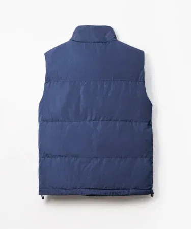 Navy sleeveless quilted jacket for men with stand-up collar and front zip closure, sold in Pakistan.