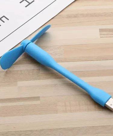 Mini portable USB flexible cooling fan with soft safe detachable blades for power bank, laptop, PC, office, travel, home use in Pakistan.