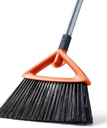 Commercial-grade grey outdoor broom with stiff bristles for heavy-duty sweeping on patios and garages.