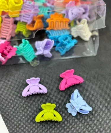 Pack of 6 small fashion solid colour hair claw clips for women's hairstyles in Pakistan