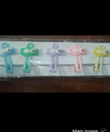 Set of 4 colorful character hair clips for kids, made of metal and baking clay, stylish design.