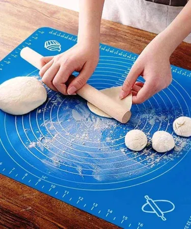 Non-stick heat resistant silicon baking and pastry mat with measurements for dough and roti.