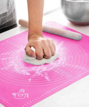 Non-stick heat resistant silicon baking and pastry mat with measurements for dough and roti.