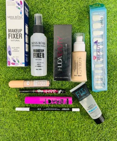 8 in 1 makeup set for women in Pakistan including fixer, foundation, primer, lip pencil, eyeliner, concealer, mascara, and nail polish.