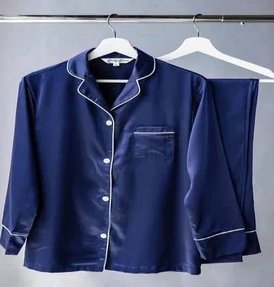Men's luxury satin pajama set with white piping, available in Pakistan.