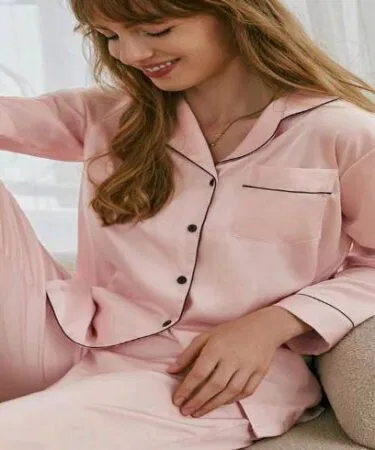 Women's luxury satin 2-piece pajama set with white piping, available in S and M sizes in Pakistan.