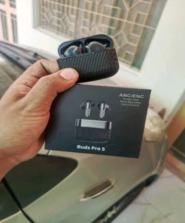 Buds Pro 5 true wireless earbuds in black & white with 24-hour battery life, sold in Pakistan.