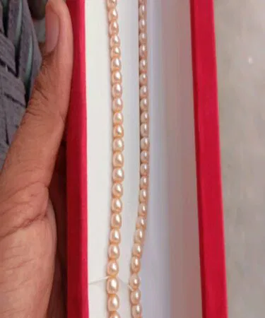Elegant peach fresh water pearl necklace for women, 92 pearls, 124ct+ white, sold in Pakistan