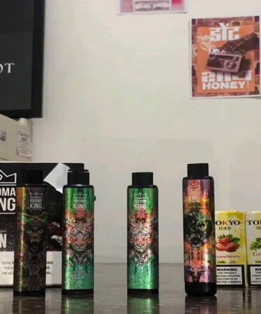 Aroma King Lion disposable vape with 3000 puffs, available in multiple flavors, sold in Pakistan.