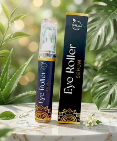 Purezza Natural Under Eye Roller serum for dark circles, puffiness, and fine lines with cooling metal applicator.