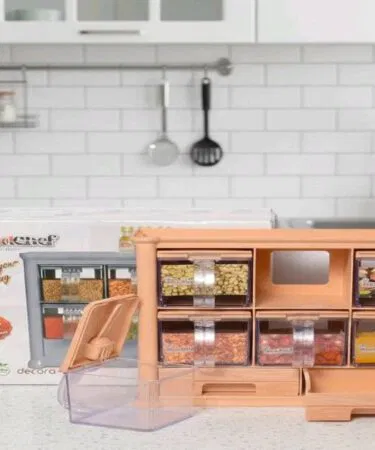 Head Chef plastic spice rack organizer with 6 jars and 2 drawers, perfect for Pakistani kitchens.