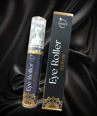 Purezza Natural Under Eye Roller serum for dark circles, puffiness, and fine lines with cooling metal applicator.