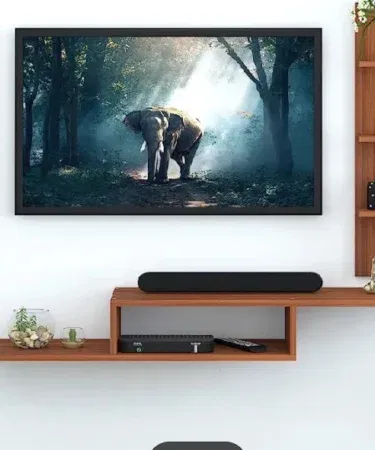 Floating wooden TV wall mount shelf, TV console, wooden stand for home entertainment in Pakistan.
