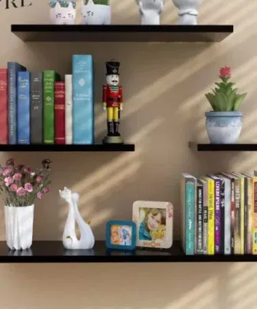 White and black wooden floating shelves for wall mounting and book storage.