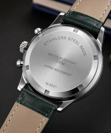 Elegant green dial chronograph watch for men with Roman numerals and leather strap sold in Pakistan