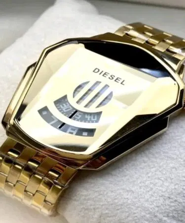 Men's DIESEL luxury gold water resistant quartz watch with chain strap sold in Pakistan