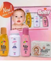 Soft Touch baby gift box with powder, lotion, liquid soap, and shampoo, dermatologically tested.